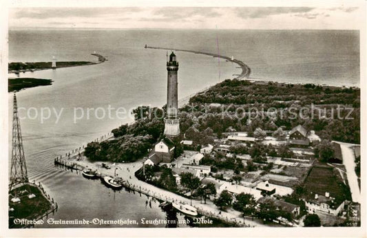 73822478 Easter Port Swinemuende aerial photograph with lighthouse and pier