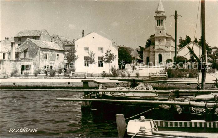 73851459 Pakostane Croatia im Hafen Blick zur Kirche