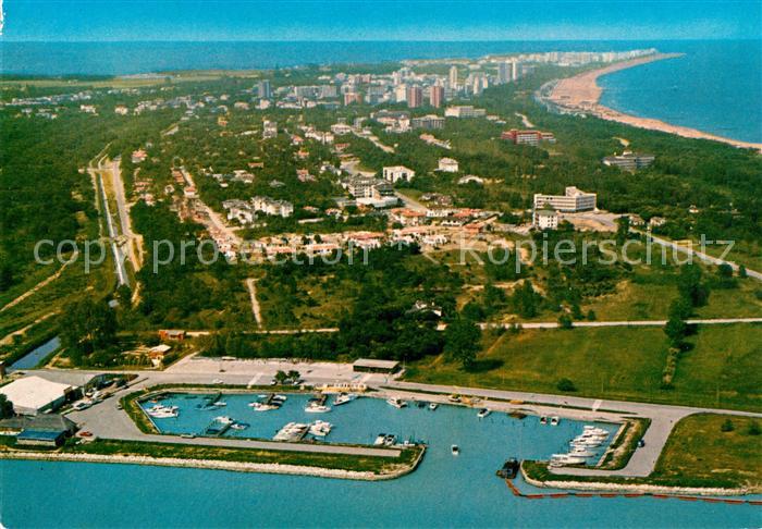 13215582 Lignano Fliegeraufnahme mit Strand und Hafen