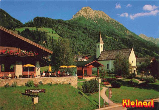 73999523 Kleinarl AT Sommerfrische Weltcup-Café Moser-Proell Blick zur Kirche