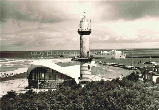 74016758 Leuchtturm Lighthouse Faro Phare-- Warnemuende Hafeneinfahrt Faehre