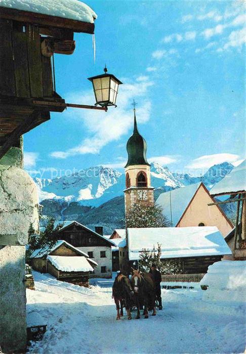 74013673 Fiss Tirol AT Ortsansicht mit Kirche Pferdeschlitten