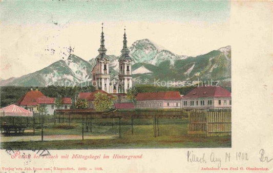 74032699 Perau VILLACH Kaernten AT Ansicht mit Kirche mit Mittagskogel im Hinter