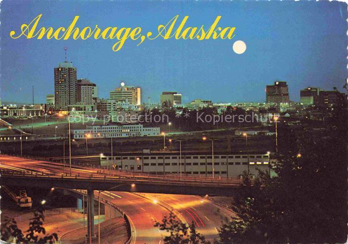 74033608 Anchorage Alaska USA Moon over the city night skyline