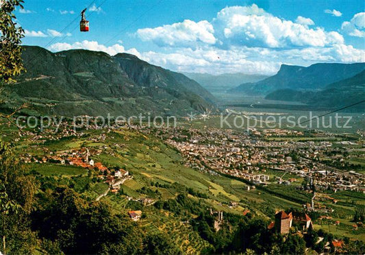 73761069 Dorf Tirol Suedtirol IT Fliegeraufnahme mit Schloss und Seilbahn Hochmu